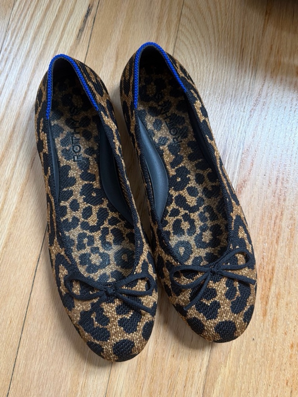 Rothy's Leopard Ballet Flats in Brown and Black with Blue Trim
